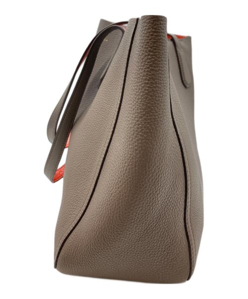 TORY BURCH（トリーバーチ）TORY BURCH (トリーバーチ) レザートートバッグ オレンジ×ブラウンの古着・服飾アイテム