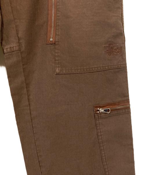 stussy（ステューシー）stussy (ステューシー) Flight pant nyco pigment dyed / ピグメントダイフライトパンツ ブラウン サイズ:32の古着・服飾アイテム