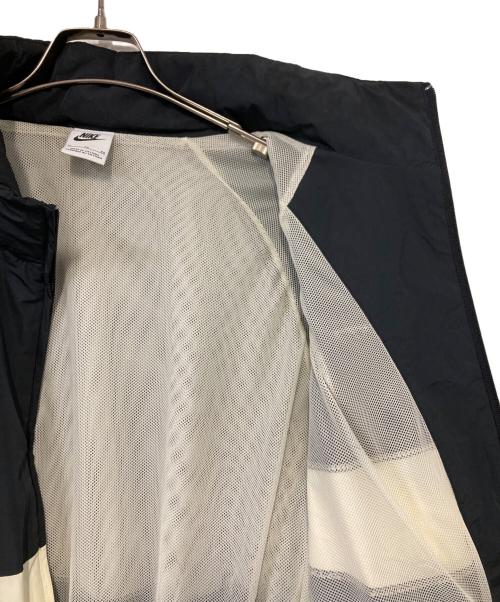 NIKE（ナイキ）NIKE (ナイキ) AS M NK SWOOSH WVN JKT ブラック×アイボリー サイズ:ＸＬの古着・服飾アイテム