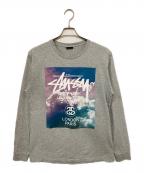 stussyステューシー）の古着「ワールドツアー長袖Tシャツ」｜グレー