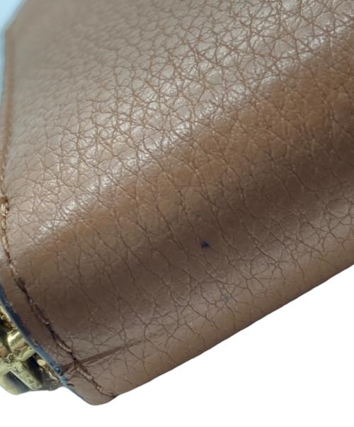 TORY BURCH（トリーバーチ）TORY BURCH (トリーバーチ) ロングジップウォレット ブラウンの古着・服飾アイテム