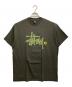 stussy（ステューシー）の古着「NIGHT CAMO T / ナイトカモロゴTシャツ」｜グリーン