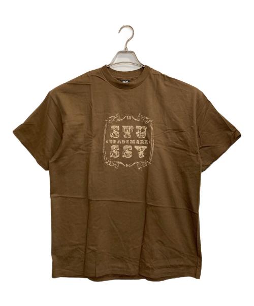 stussy（ステューシー）stussy (ステューシー) TRADEMARK T / トレードマークロゴTシャツ ブラウン サイズ:XLの古着・服飾アイテム