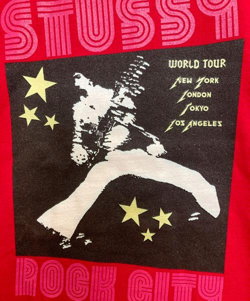 stussy（ステューシー）stussy (ステューシー) ROCK CITY WORLD TOUR T / ロックシティワールドツアーTシャツ レッド サイズ:XLの古着・服飾アイテム