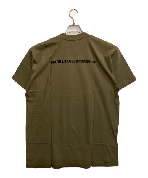 stussy（ステューシー）stussy (ステューシー) STARS AND STRIPES SKULL SS LOGO T / 星条旗SSロゴスカルTシャツ グリーン サイズ:XLの古着・服飾アイテム