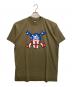 stussy（ステューシー）の古着「STARS AND STRIPES SKULL SS LOGO T / 星条旗SSロゴスカルTシャツ」｜グリーン
