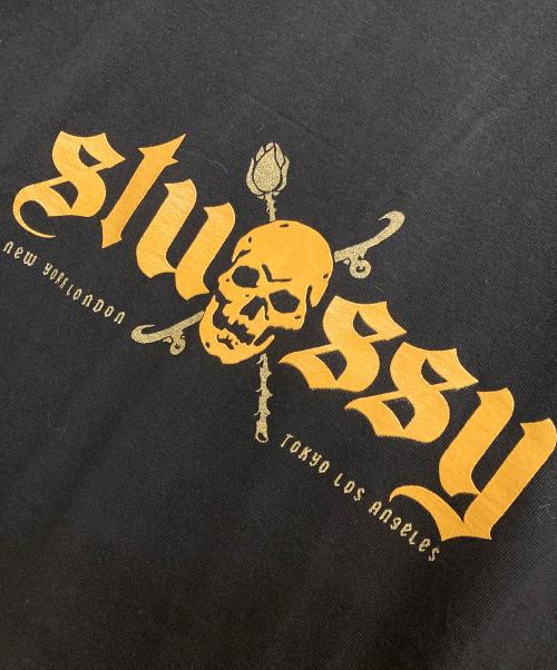 stussy（ステューシー）stussy (ステューシー) SKULL LOGO TOUR T / スカルロゴツアーTシャツ ブラック サイズ:XLの古着・服飾アイテム