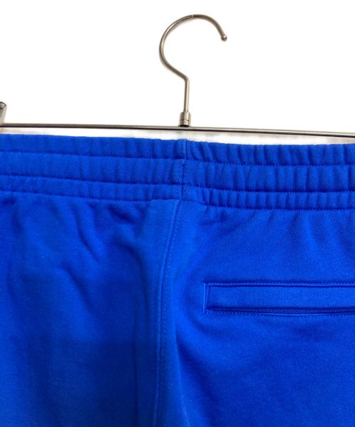 LACOSTE（ラコステ）LACOSTE (ラコステ) サイドラインスウェットパンツ ブルー×レッド サイズ:Mの古着・服飾アイテム