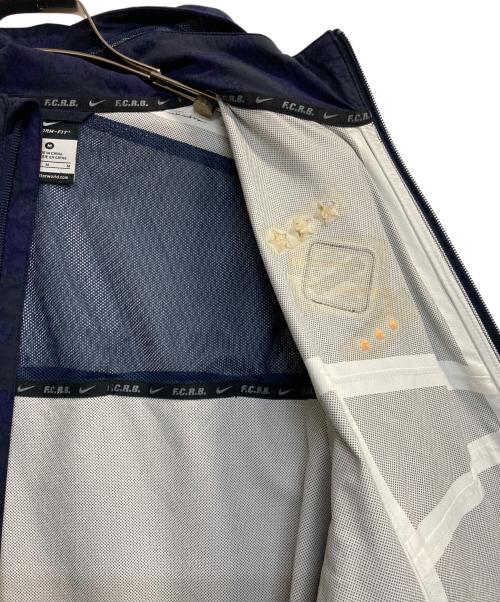 F.C.R.B.（エフシーレアルブリストル）F.C.R.B. (エフシーレアルブリストル) NIKE (ナイキ) PACKABLE STORM-FIT RAIN JACKET ブラック×ネイビー サイズ:Ｍの古着・服飾アイテム