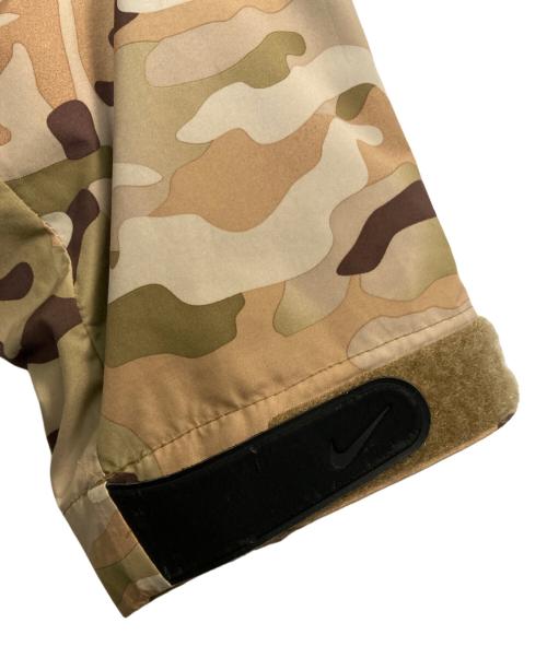 NIKE（ナイキ）NIKE (ナイキ) F.C.R.B. (エフシーレアルブリストル) CAMO HOODY JACKET カーキ サイズ:Ｌの古着・服飾アイテム
