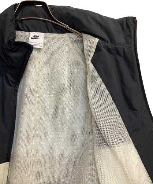 NIKE（ナイキ）NIKE (ナイキ) AS M NK SWOOSH WVN JKT ブラック×アイボリー サイズ:Ｍの古着・服飾アイテム