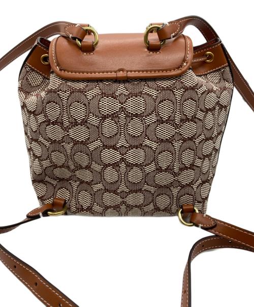 COACH（コーチ）COACH (コーチ) キャンバスシグネチャーミニリュックの古着・服飾アイテム