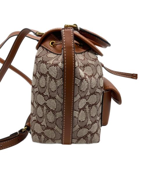 COACH（コーチ）COACH (コーチ) キャンバスシグネチャーミニリュックの古着・服飾アイテム