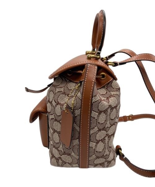 COACH（コーチ）COACH (コーチ) キャンバスシグネチャーミニリュックの古着・服飾アイテム