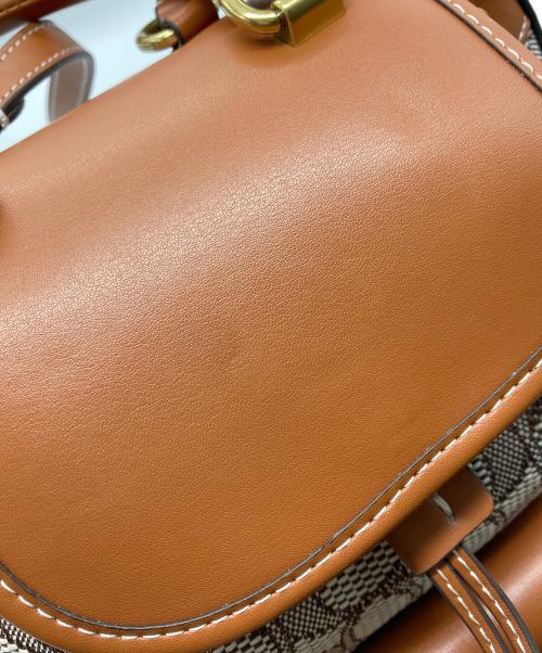 COACH（コーチ）COACH (コーチ) キャンバスシグネチャーミニリュックの古着・服飾アイテム