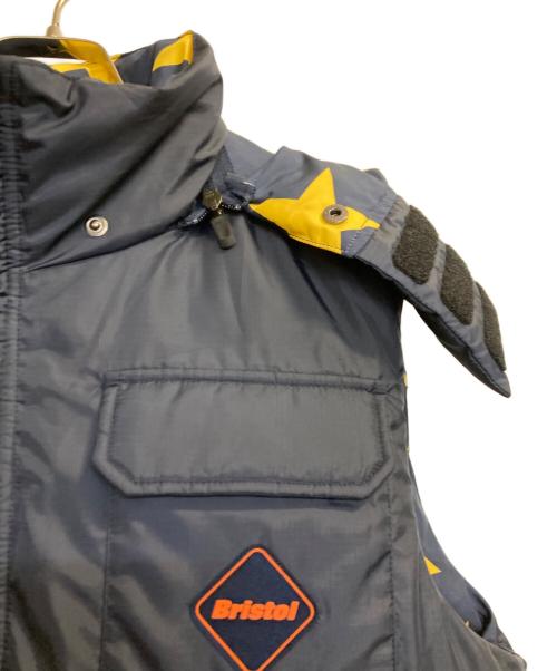 F.C.R.B.（エフシーレアルブリストル）F.C.R.B. (エフシーレアルブリストル) Star Reversible Down Vest / スタープリントリバーシブルダウンベスト ネイビー サイズ:Ｍの古着・服飾アイテム