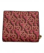 COACHコーチ）の古着「モノグラム2つ折り財布」｜ピンク