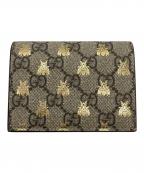 GUCCIグッチ）の古着「GGスプリーム ステンシル2つ折り財布」｜ベージュ