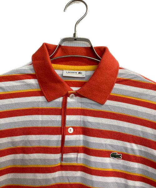 LACOSTE（ラコステ）LACOSTE (ラコステ) ポロシャツ ホワイト×オレンジ サイズ:4の古着・服飾アイテム