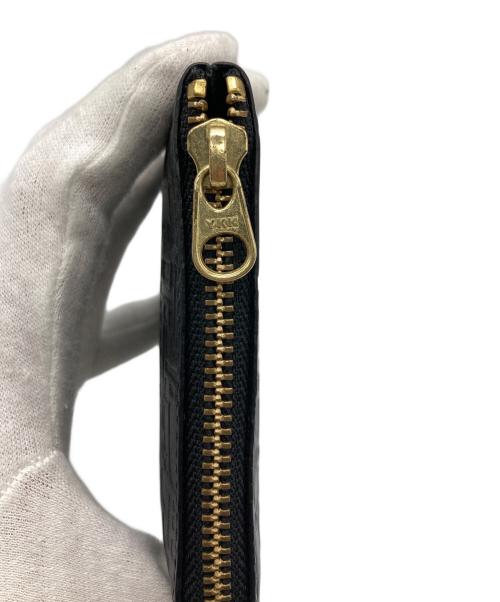 COMME des GARCONS（コムデギャルソン）COMME des GARCONS (コムデギャルソン) エンボスロゴコインケースの古着・服飾アイテム