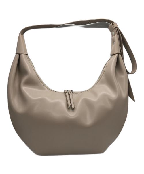 CHARLES & KEITH（チャールズアンドキース）CHARLES & KEITH (チャールズアンドキース) カーブホーボーバッグ ベージュの古着・服飾アイテム