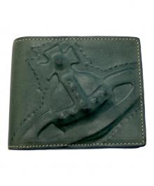 Vivienne Westwood（ヴィヴィアンウエストウッド）の古着「エンボス3Dオーブレザーコンパクトウォレット / 2つ折り財布」｜グリーン