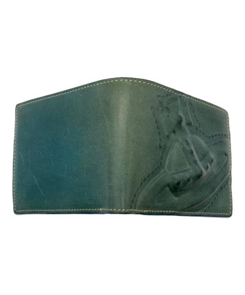 Vivienne Westwood（ヴィヴィアンウエストウッド）Vivienne Westwood (ヴィヴィアンウエストウッド) エンボス3Dオーブレザーコンパクトウォレット / 2つ折り財布 グリーンの古着・服飾アイテム