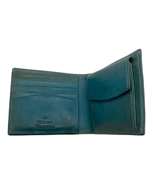 Vivienne Westwood（ヴィヴィアンウエストウッド）Vivienne Westwood (ヴィヴィアンウエストウッド) エンボス3Dオーブレザーコンパクトウォレット / 2つ折り財布 グリーンの古着・服飾アイテム