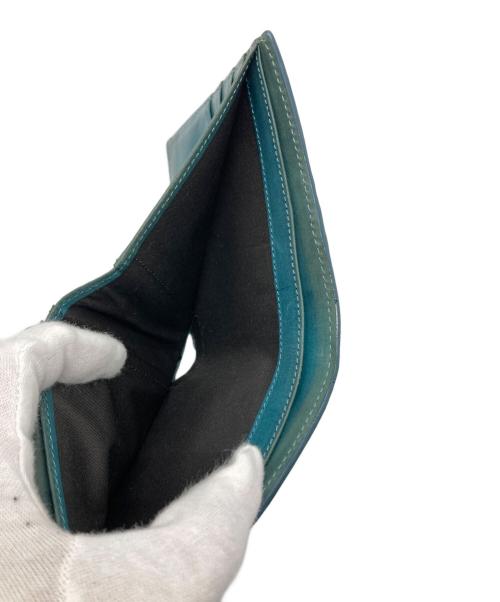 Vivienne Westwood（ヴィヴィアンウエストウッド）Vivienne Westwood (ヴィヴィアンウエストウッド) エンボス3Dオーブレザーコンパクトウォレット / 2つ折り財布 グリーンの古着・服飾アイテム