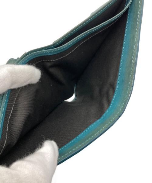 Vivienne Westwood（ヴィヴィアンウエストウッド）Vivienne Westwood (ヴィヴィアンウエストウッド) エンボス3Dオーブレザーコンパクトウォレット / 2つ折り財布 グリーンの古着・服飾アイテム