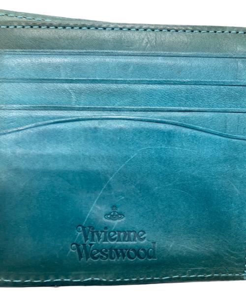 Vivienne Westwood（ヴィヴィアンウエストウッド）Vivienne Westwood (ヴィヴィアンウエストウッド) エンボス3Dオーブレザーコンパクトウォレット / 2つ折り財布 グリーンの古着・服飾アイテム