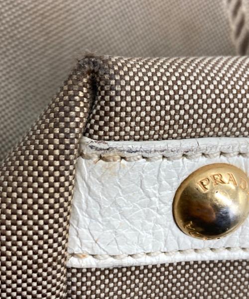 PRADA（プラダ）PRADA (プラダ) ロゴジャガードスタッズトートバッグ ベージュの古着・服飾アイテム