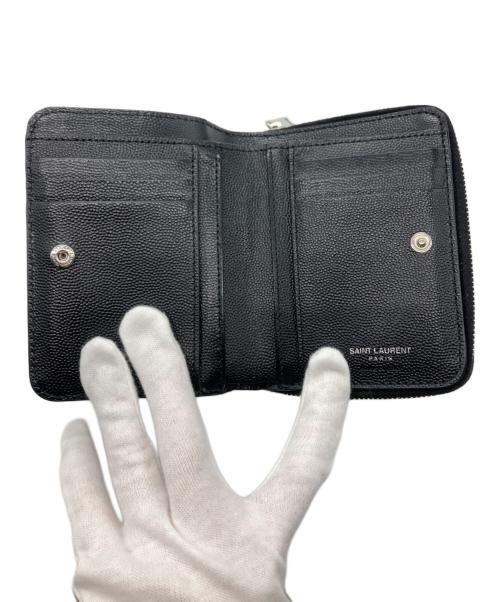 Saint Laurent Paris（サンローランパリ）Saint Laurent Paris (サンローランパリ) カサンドラロゴコンパクトキャビアスキンウォレット ブラックの古着・服飾アイテム