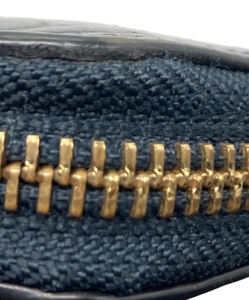 COACH（コーチ）COACH (コーチ) エンボスラウンドファスナー財布 ネイビーの古着・服飾アイテム