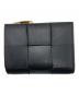 BOTTEGA VENETA（ボッテガベネタ）の古着「カセットコンパクトウォレット」｜ブラック
