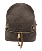 MICHAEL KORSマイケル・コース）の古着「モノグラムリュック」｜ブラウン