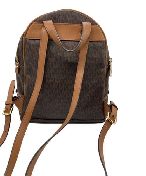 MICHAEL KORS（マイケル・コース）MICHAEL KORS (マイケル・コース) モノグラムリュック ブラウンの古着・服飾アイテム
