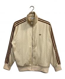 adidas（アディダス）の古着「モノグラム サテン ファイヤーバード トラックジャケット」｜ベージュ