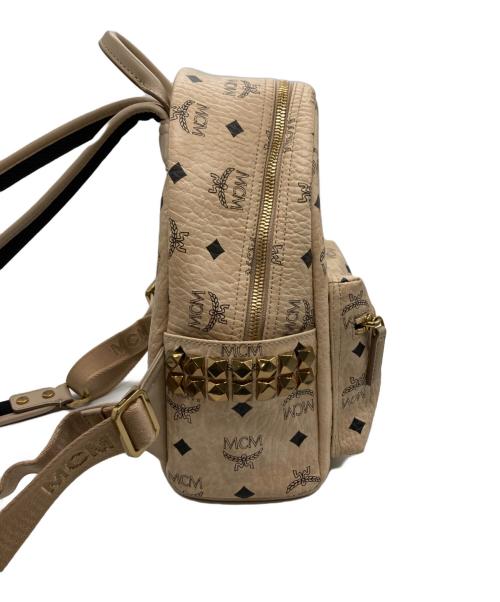 MCM（エムシーエム）MCM (エムシーエム) ヴィセトス スターク スタッズミニリュック ベージュの古着・服飾アイテム