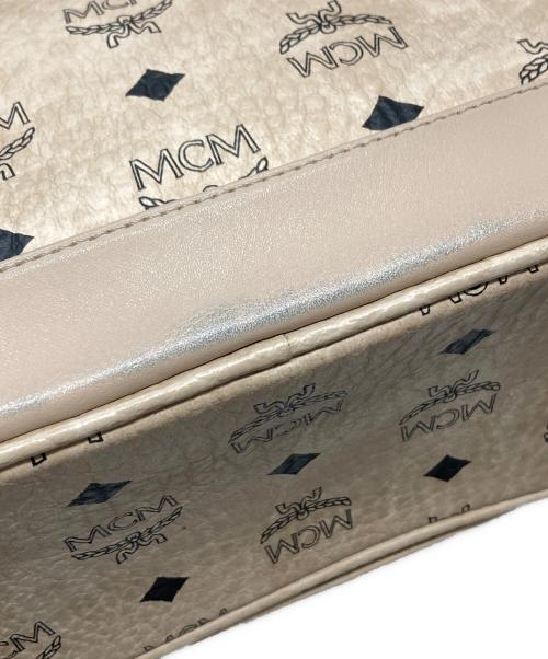 MCM（エムシーエム）MCM (エムシーエム) ヴィセトス スターク スタッズミニリュック ベージュの古着・服飾アイテム