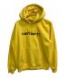 CarHartt（カーハート）の古着「ロゴ刺繍パーカー」｜イエロー