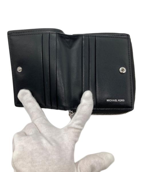 MICHAEL KORS（マイケル・コース）MICHAEL KORS (マイケル・コース) EMPIRE バイフォールド ジップ ウォレット ブラックの古着・服飾アイテム