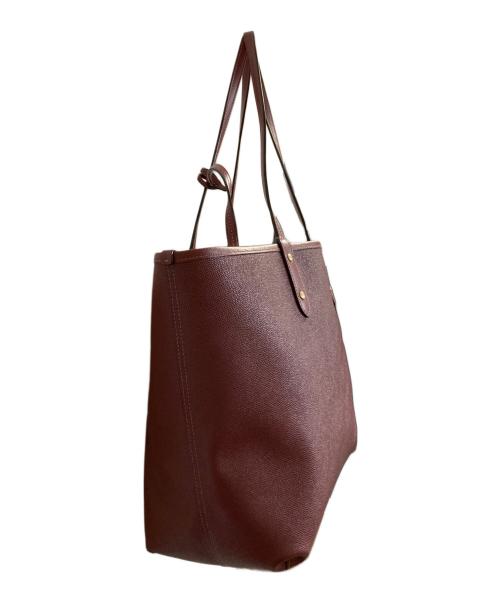 COACH（コーチ）COACH (コーチ) PVC レオパード柄 プリント リバーシブル ポーチ付き シティトート ベージュ×レッドの古着・服飾アイテム
