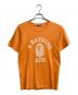 A BATHING APE（アベイシングエイプ）の古着「ロゴTシャツ」｜オレンジ