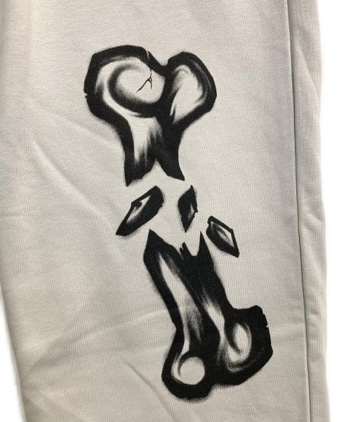 X-LARGE（エクストララージ）X-LARGE (エクストララージ) ALLOVER PRINTED SWEAT PANTS グレー サイズ:XLの古着・服飾アイテム