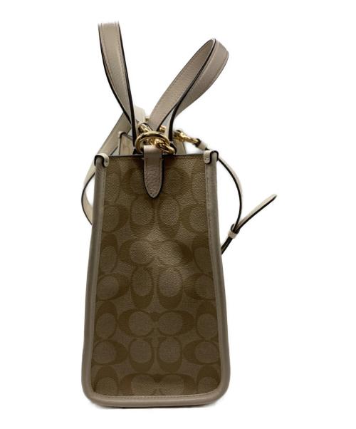 COACH（コーチ）COACH (コーチ) デンプシー キャリーオール シグネチャー キャンバス ベージュの古着・服飾アイテム