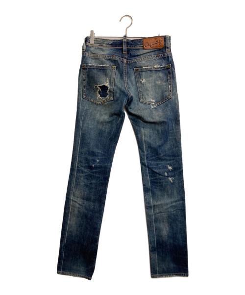 DSQUARED2（ディースクエアード）DSQUARED2 (ディースクエアード) ダメージペイントデニムパンツ インディゴ サイズ:42の古着・服飾アイテム