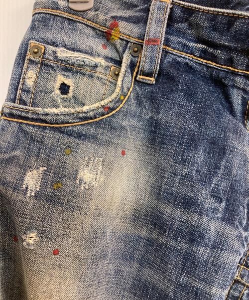 DSQUARED2（ディースクエアード）DSQUARED2 (ディースクエアード) ダメージペイントデニムパンツ インディゴ サイズ:42の古着・服飾アイテム