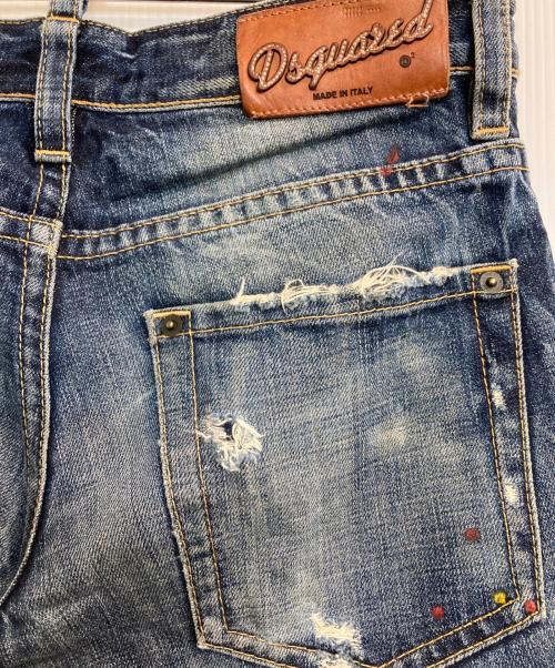 DSQUARED2（ディースクエアード）DSQUARED2 (ディースクエアード) ダメージペイントデニムパンツ インディゴ サイズ:42の古着・服飾アイテム