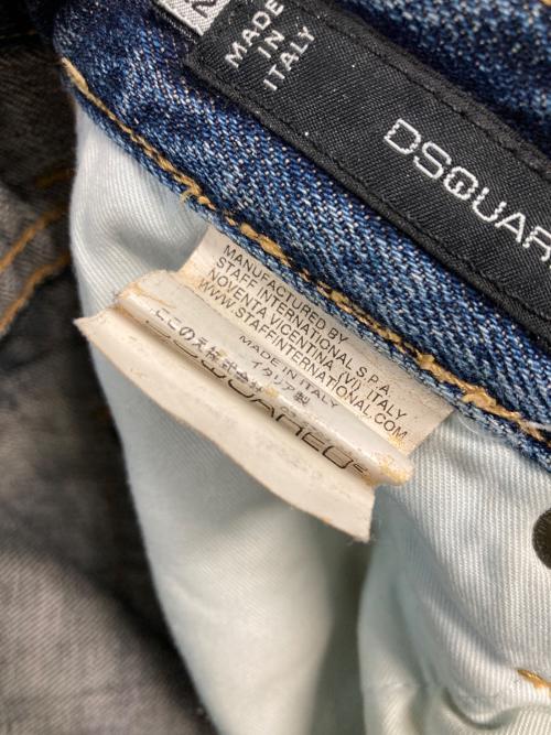 DSQUARED2（ディースクエアード）DSQUARED2 (ディースクエアード) ダメージペイントデニムパンツ インディゴ サイズ:42の古着・服飾アイテム